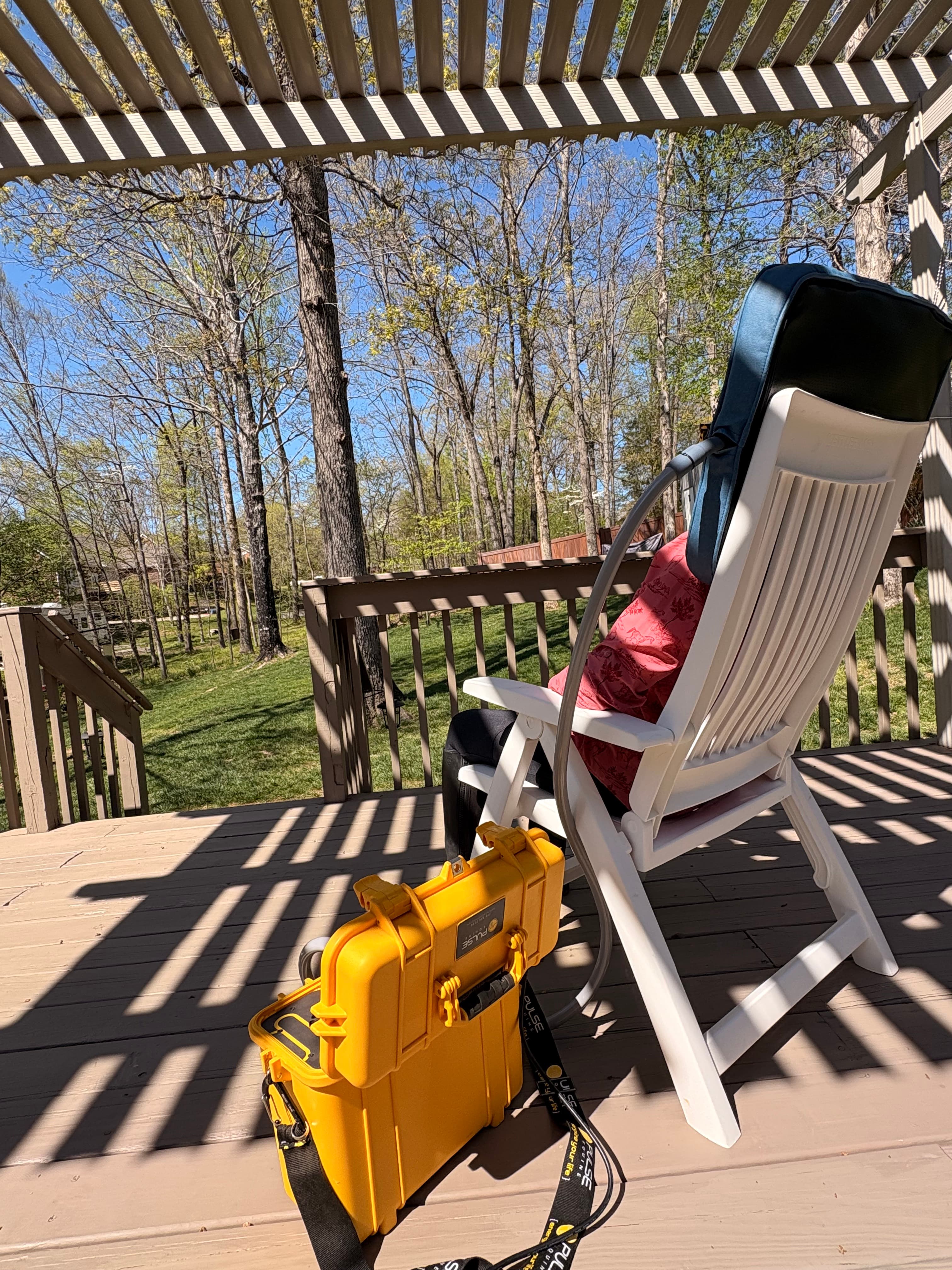 Client seated for an in-home PEMF session
